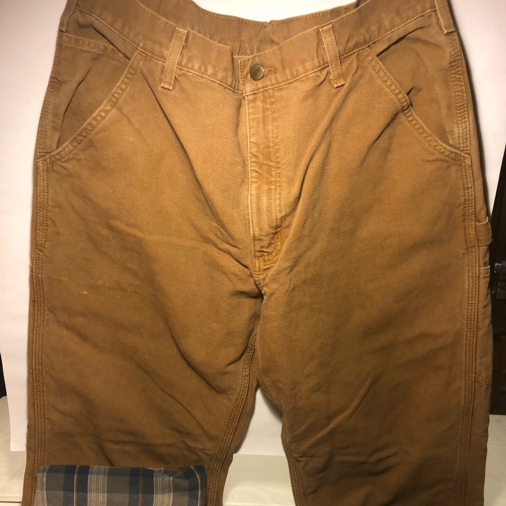Carhartt washed duck pant with flannel lining.